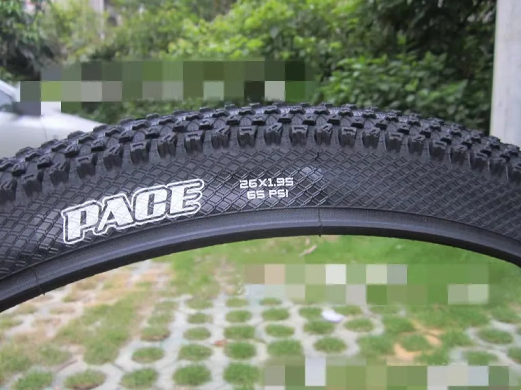 Mountain bike ultralight puncture proof tyre showing tread and sidewall, available in 26, 27.5, and 29-inch sizes.