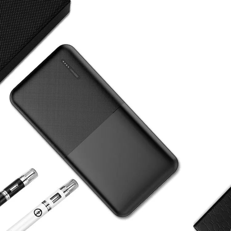 20000 mAh portable power bank with multiple USB ports in black or white colour measuring 140x69x26mm