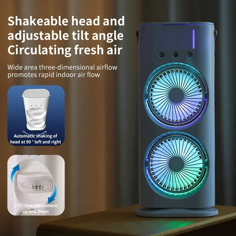 White double-ended portable USB fan with humidifying spray tank and remote control on a desk.