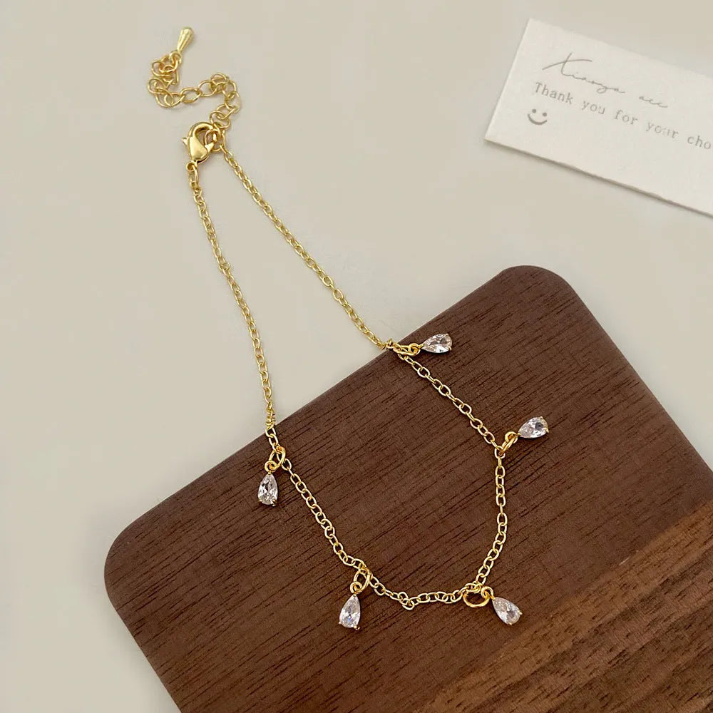 Geometric zircon jewellery set with necklace, earrings and anklet in Korean-style meteor shower design