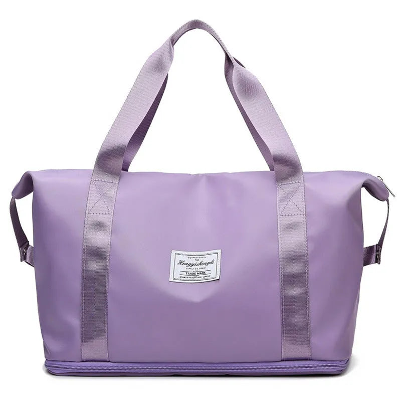 Large capacity Oxford cloth shoulder bag in lake green with multiple zippered pockets for travel