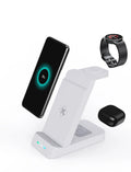 Black 3-in-1 wireless charging station showing a phone, AirPods case, and smartwatch charging on its stand.