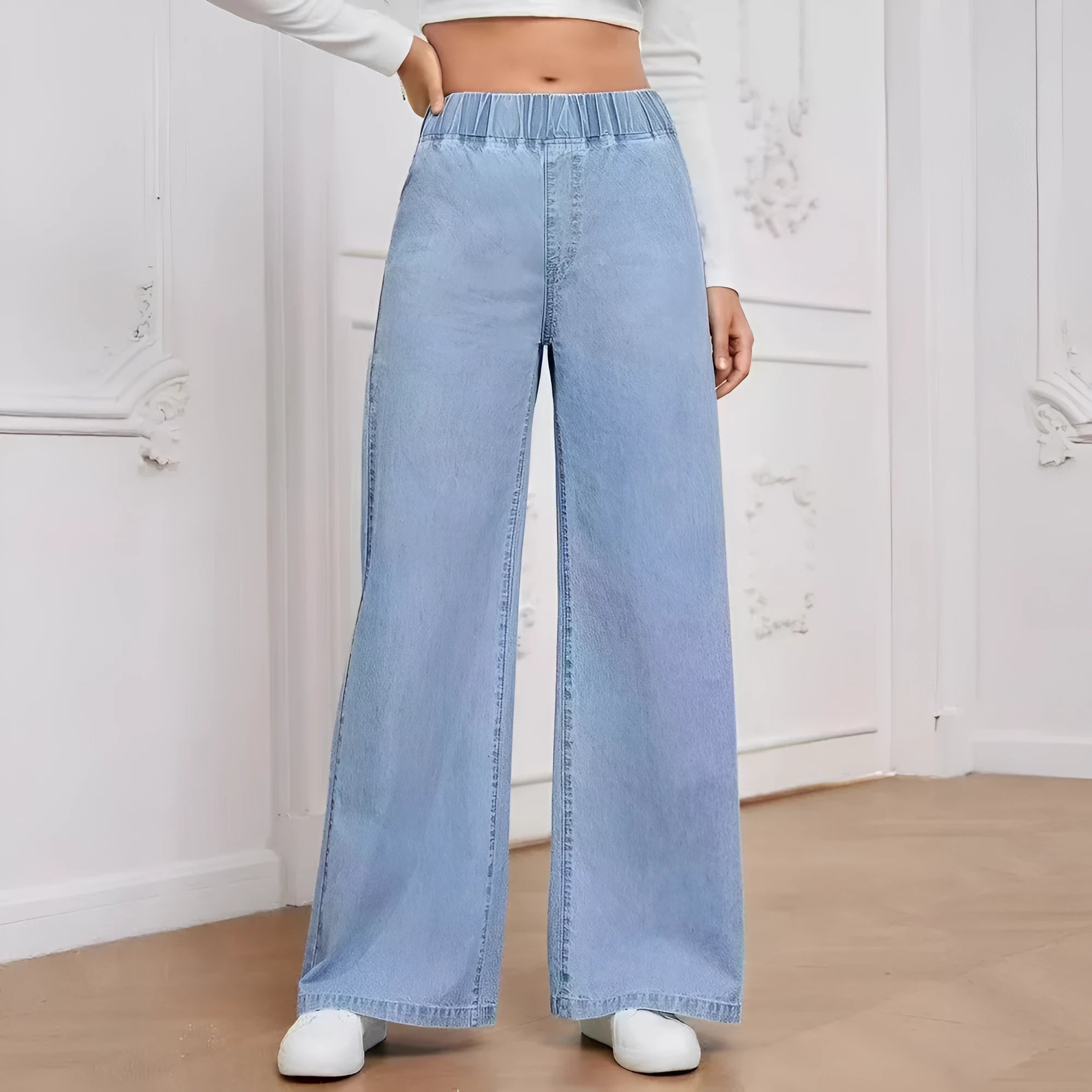 Plus size light blue washed denim wide-leg jeans with straight cut and mid-rise waist