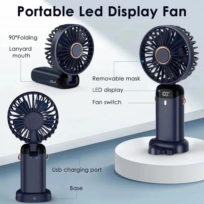 Mini portable handheld electric fan in blue with foldable design and LED battery display