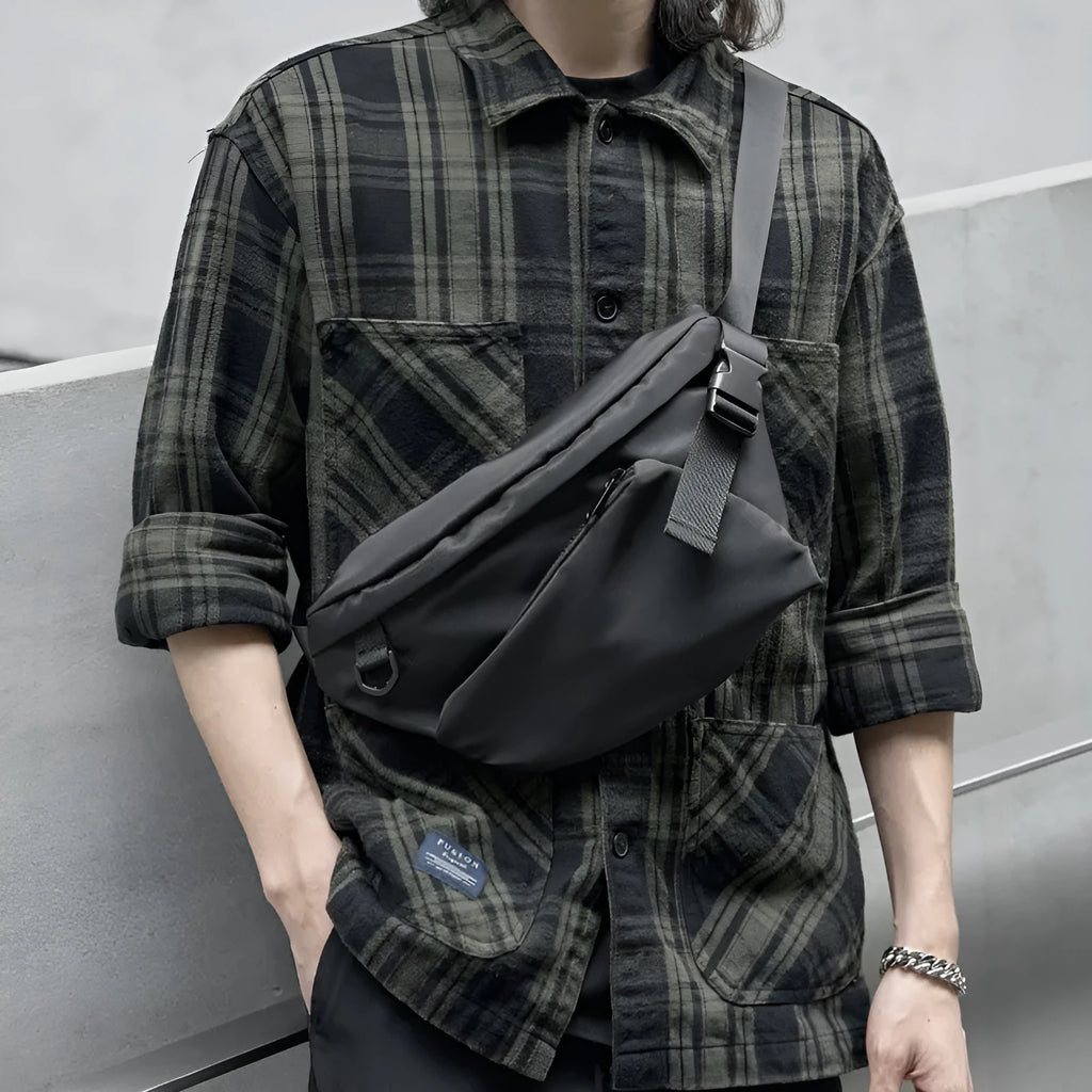 Men's black Oxford fabric chest bag with slanted design and visible sewing lines
