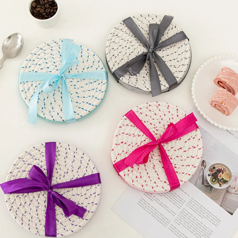 Three round 18cm cotton cord coaster placemats in modern minimalist design