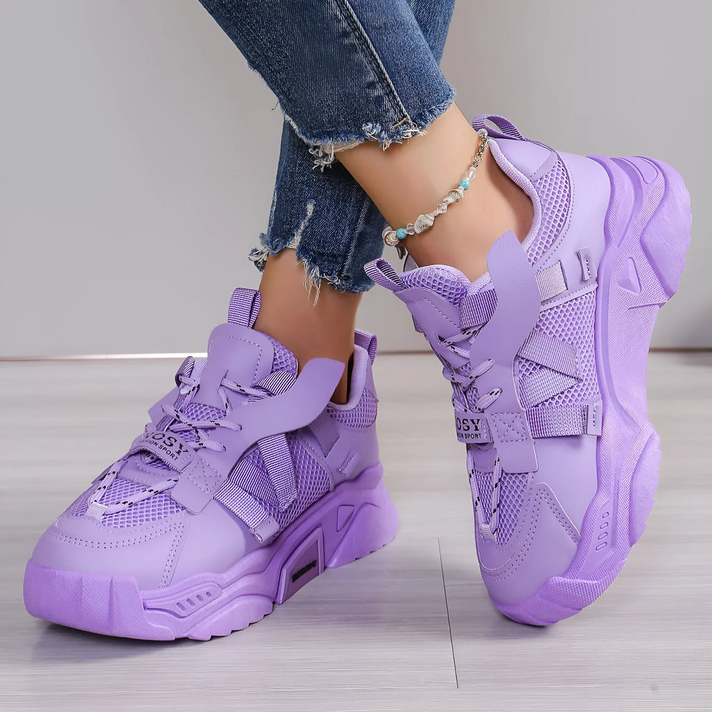 Women's purple animal pattern platform mesh dad shoes with lace-up front.