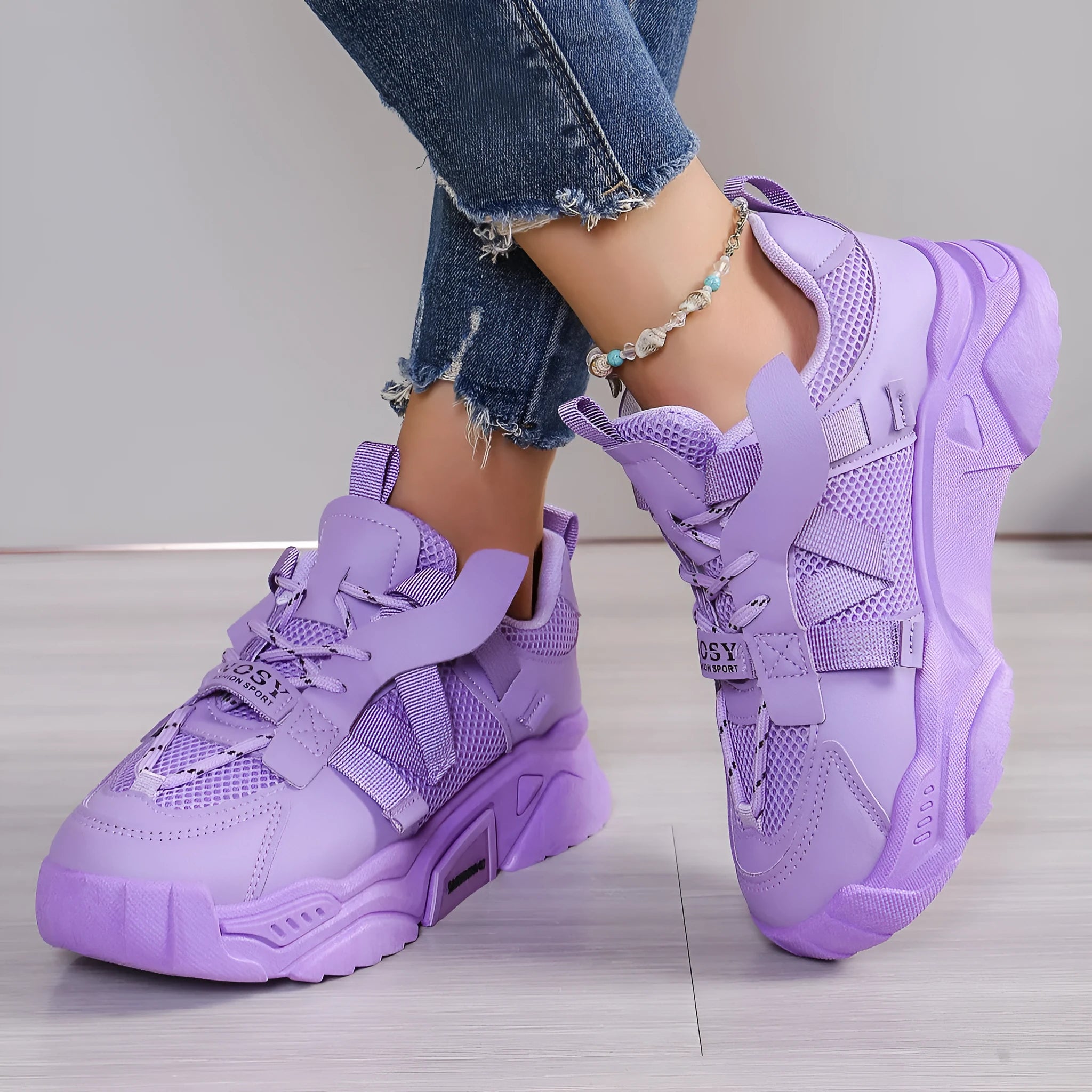 Women's purple animal pattern platform mesh dad shoes with lace-up front.