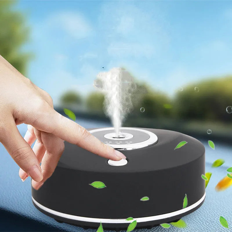 USB-powered car air freshener spray unit in black, grey or white with charging cable and anti-slip pad