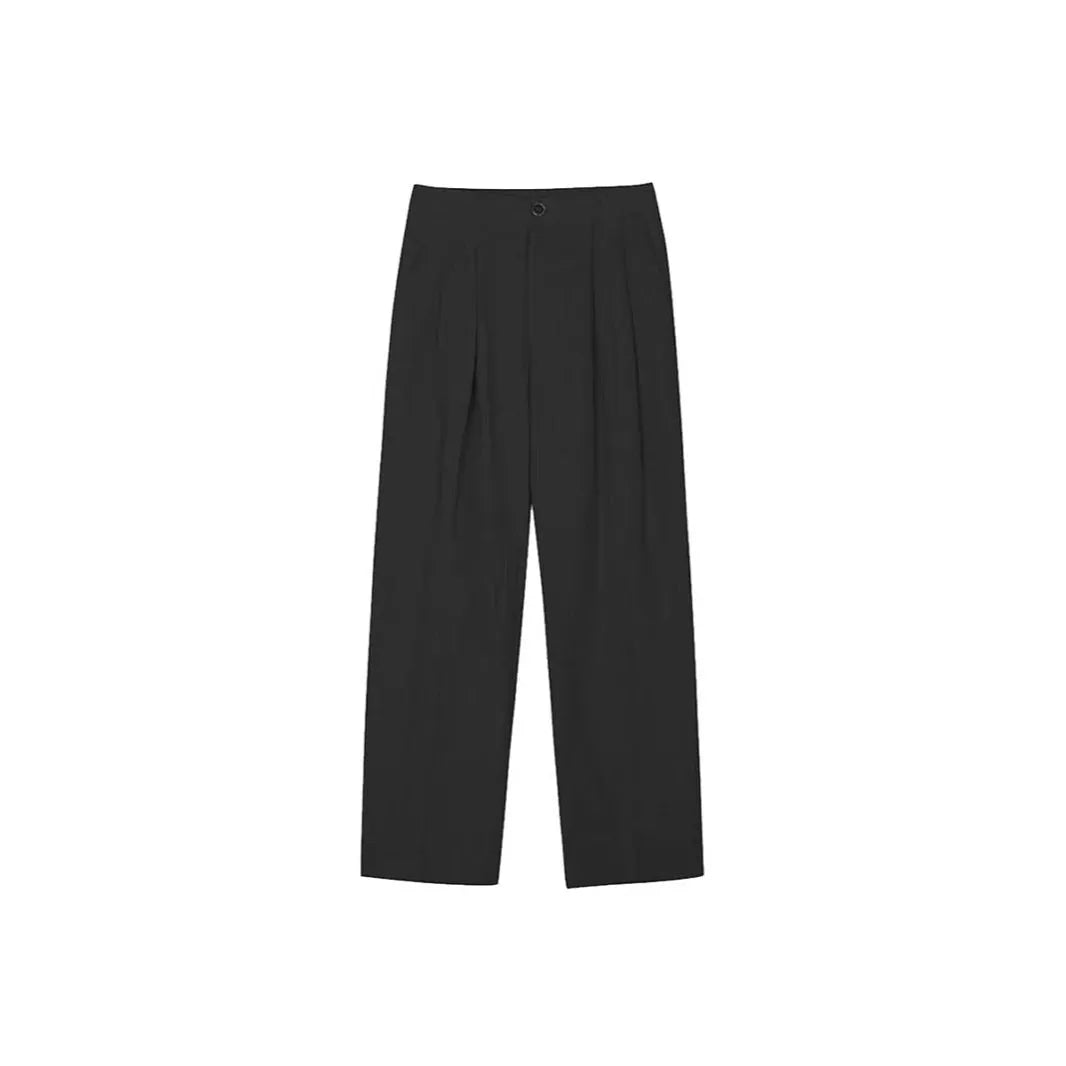 Men's loose-fit apricot cotton linen trousers with a mid-waist and pencil leg opening.