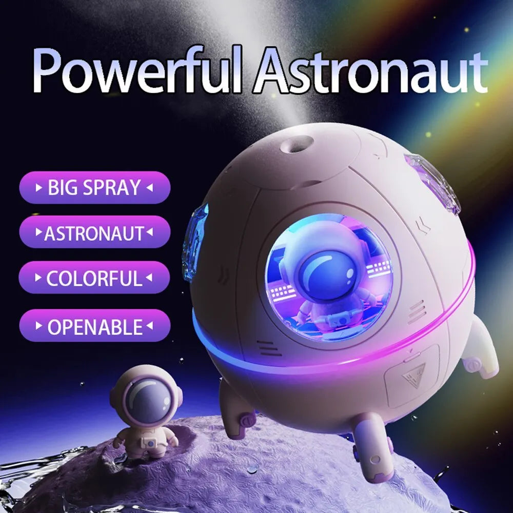 Astronaut-shaped portable USB humidifier with LED light on a desk