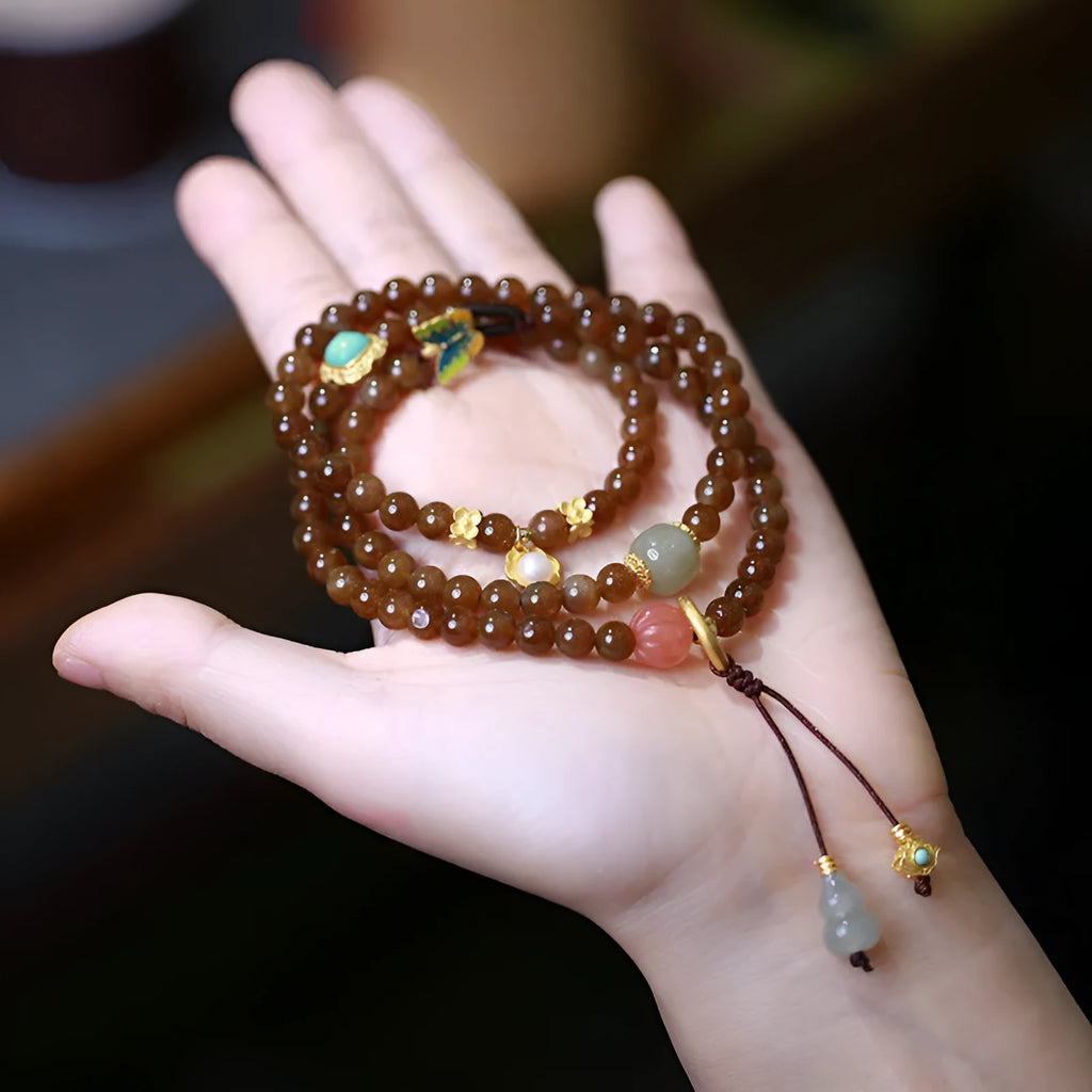 Brown jade Hetian jade three-ring geometric bracelet with silver-plated butterfly and gourd pearl accents