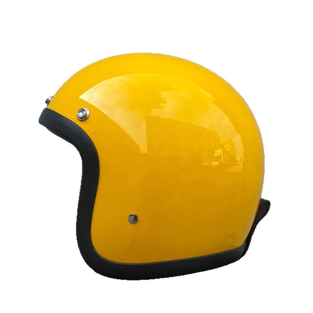 Retro-style glass fibre half motorcycle helmet shown in a selection of colours and prints.