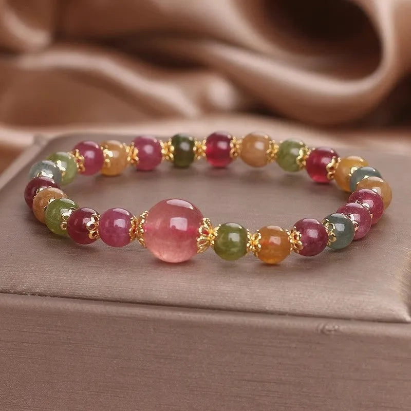 Handmade tourmaline strawberry quartz bracelet with 10mm round lucky beads for gifting occasions