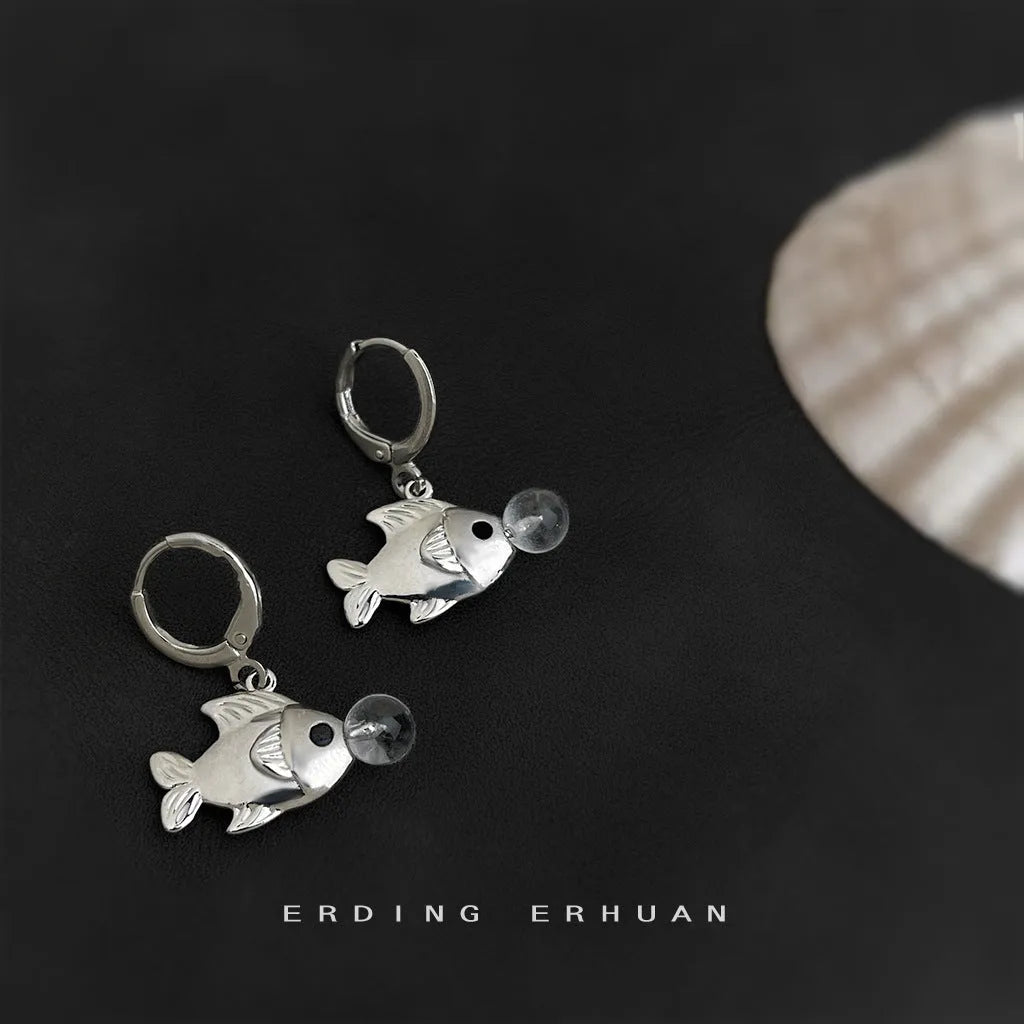 A pair of original design Bubble Fish earrings made from copper with an electroplated finish, featuring goldfish animal modelling.