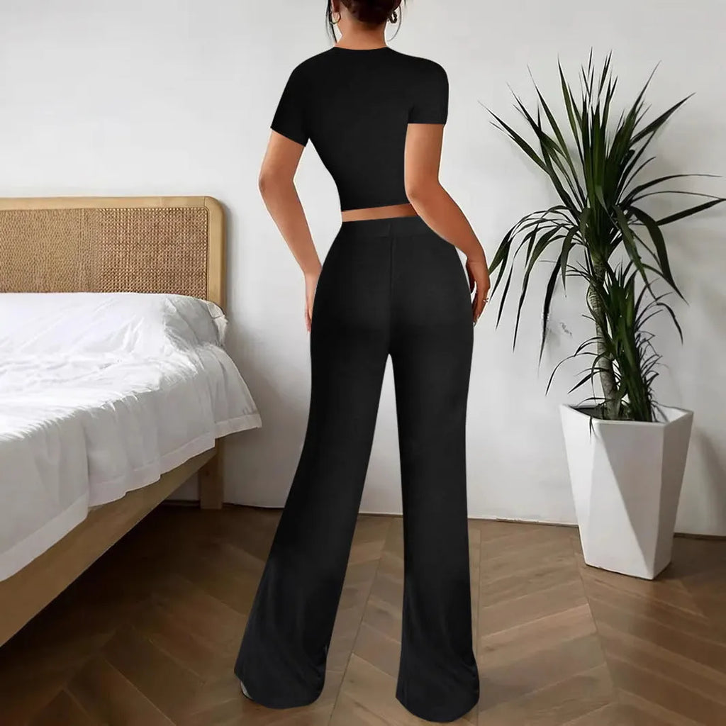 Black women's co-ord suit set with high-waist trousers and short-sleeve t-shirt