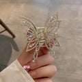 Butterfly design alloy hair barrette with electroplated finish measuring 6.7x6.2cm