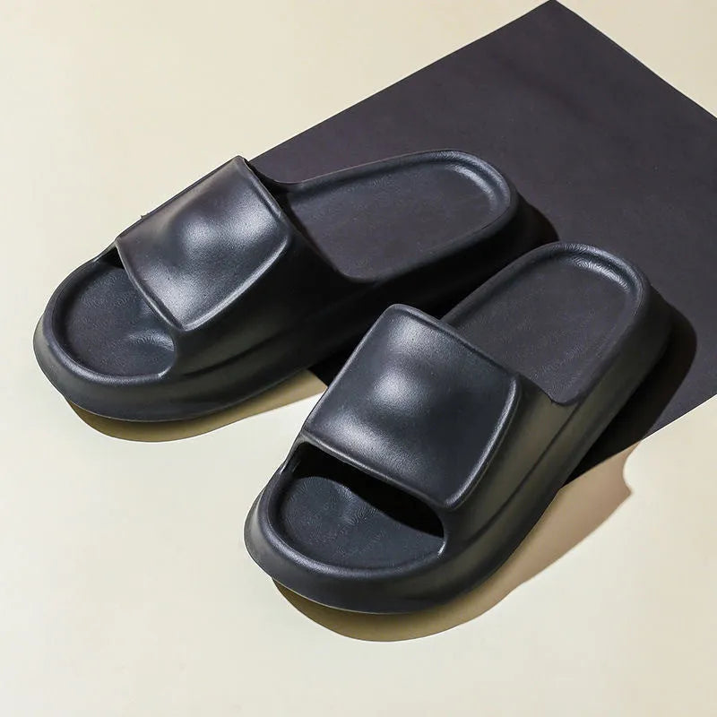 Soft unisex EVA house slippers with a thick non-slip sole in multiple colours.