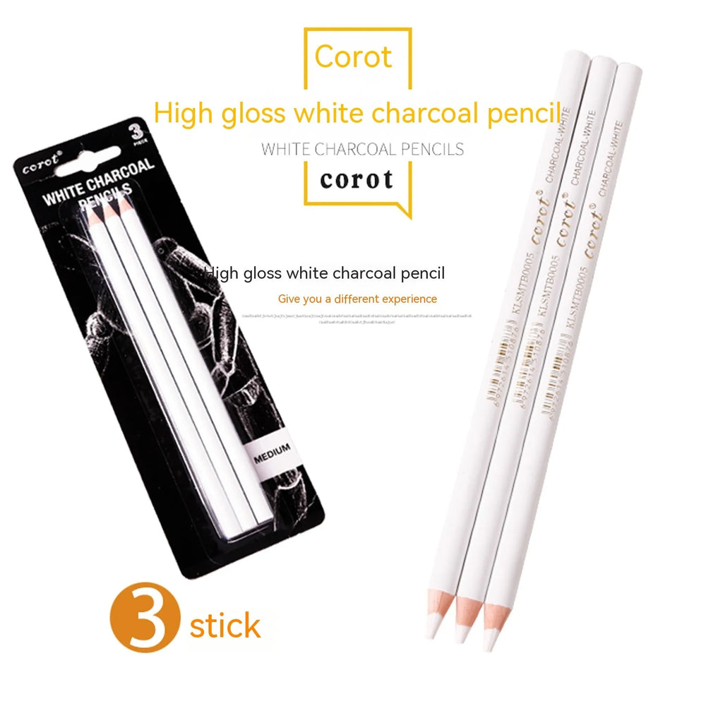 Three white charcoal sketching pencils with wooden shells on a dark surface.