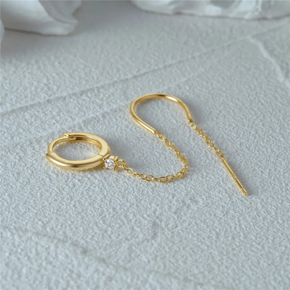 S925 sterling silver geometric ear clip studs with flower and chain design in golden electroplate.