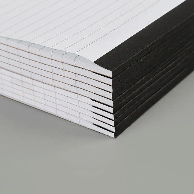 A4 tearable notebook with grid-lined paper and wireless adhesive binding