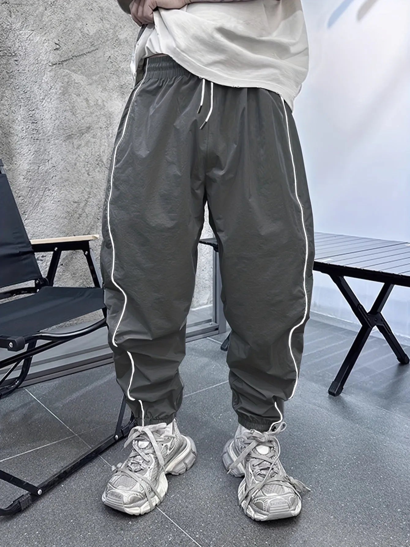 Men's loose fit bamboo fibre cropped sports trousers in Army Green colour.