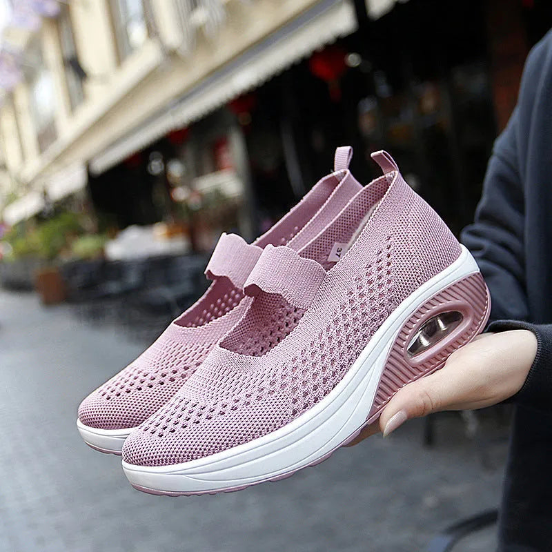 Women's black mesh slip-on casual shoes with round toe and low heel