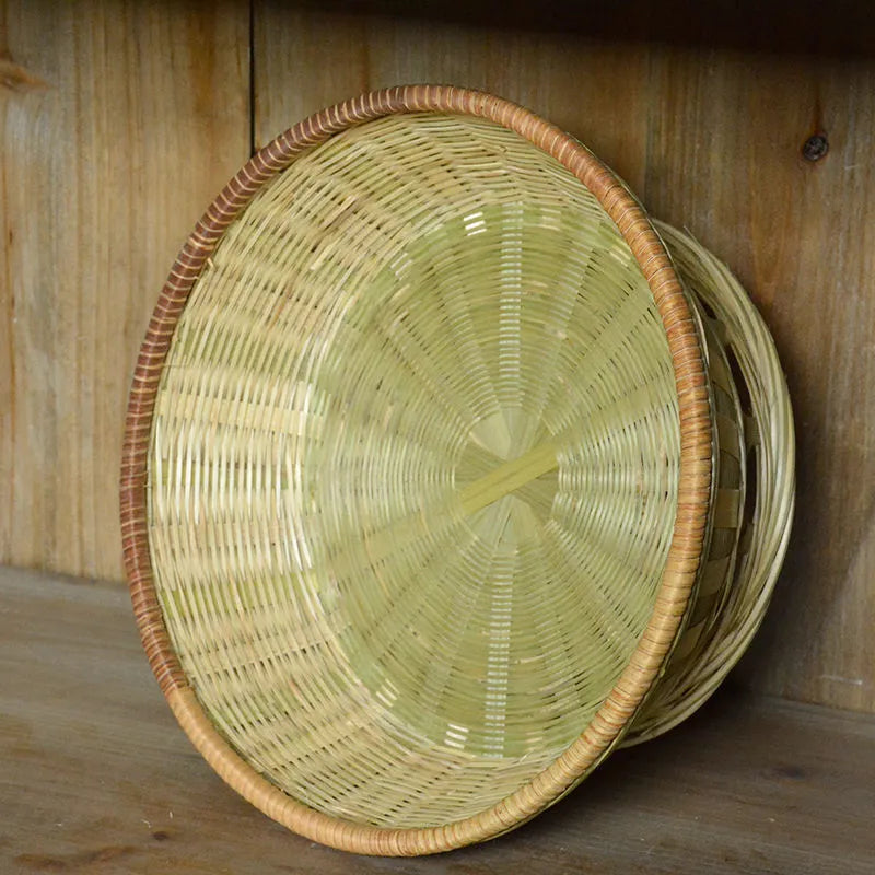Handmade natural bamboo storage basket with open weave design in three size variations