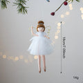 Pink and white cloth ballet girl angel plush doll pendant on a plain background.