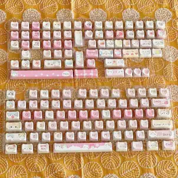 Meow Meow Team 141-piece sublimation keycap set showing colourful anime character designs on plastic keyboard keycaps