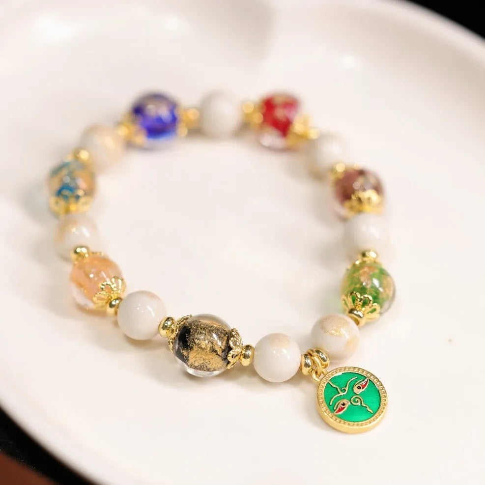 Handmade glazed bracelet with Five Gods of Wealth charm and 10mm geometric beads.