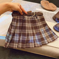 Children's cotton plaid pleated skirt with A-line silhouette shown on mannequin