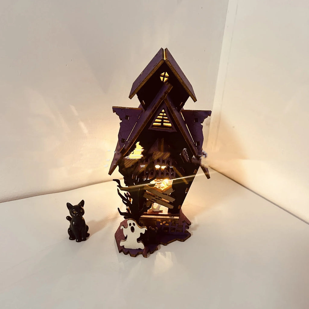Wooden haunted house Halloween decoration with luminous finish, 14 cm wide candlestick holder