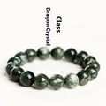 Natural green dragon crystal round bead bracelet with ruyi detail on a white background.