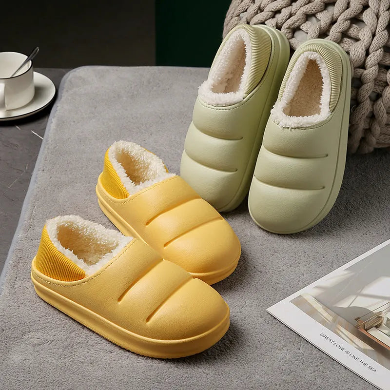 Women's waterproof EVA slippers in various colours with plush lining and a non-slip flat sole.
