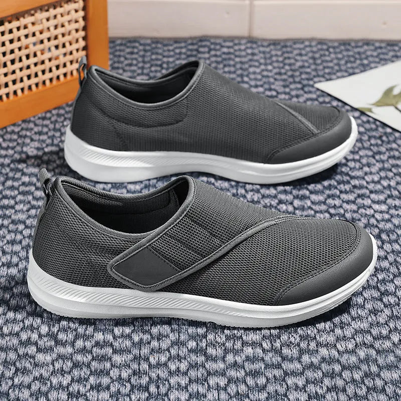 Summer walking shoes with mesh upper, flat heel, and Velcro fastening in black, grey, blue, or wine red.