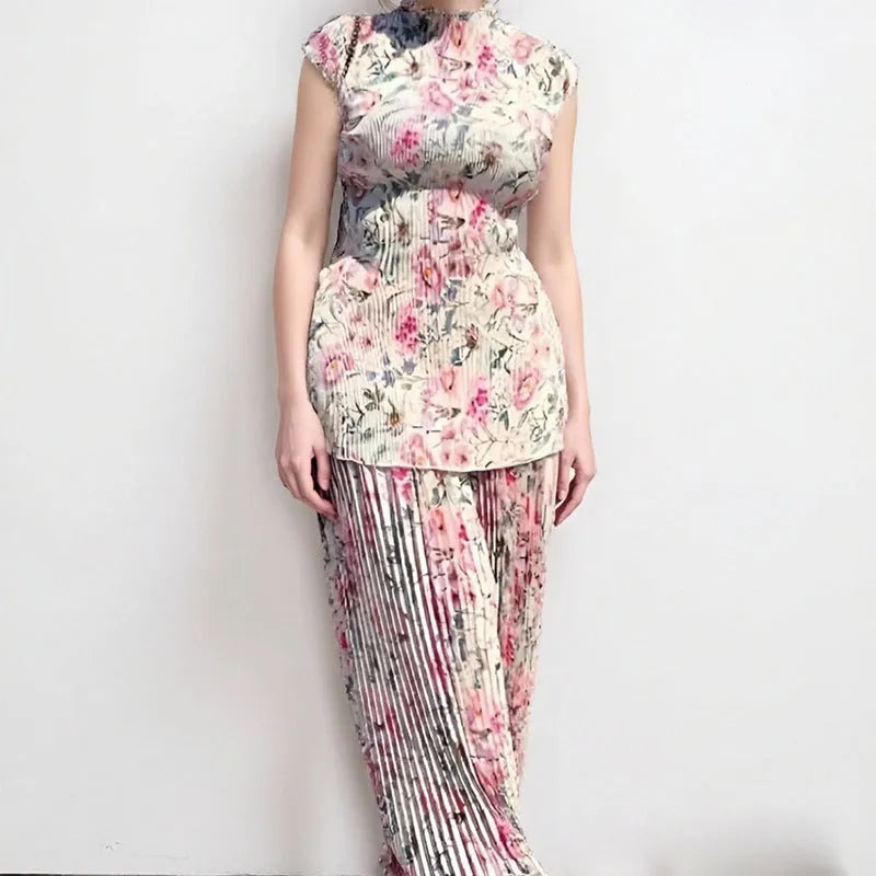 Women's printed chiffon dress set with high waist skirt and long sleeve top.